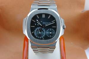PATEK PHILIPPE 5712/1A NAUTILUS MOONPHASE POWER RESERVE BOX/PAPERS 