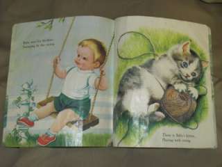   First Book Baby Looks Oil Cloth Book 1960 Illus. by E. Wilkin  