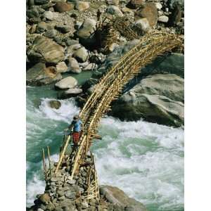  Female Hiker on Bamboo Bridge over the Marsygandi River 