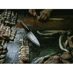  Eel Is Skewered and Sold at a Market in Tokyo Stretched 