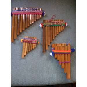    Set of Four Varnished Andean Pan Flutes Musical Instruments