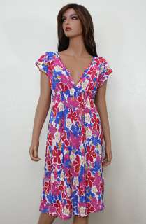 description vibrantly colored cover up short dress which features a 