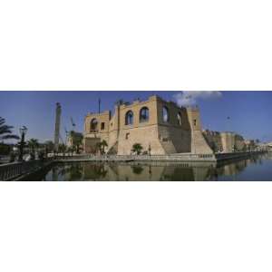 Reflection of a Building in a Pond, Assai Al Hamra, Tripoli, Libya by 