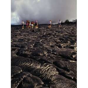 Group of Tourists Crossing Lava Fields, Hawaii Volcanoes National Park 