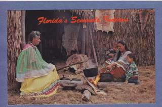   SEMINOLE INDIAN FAMILY LOT (2) CHROME PCS COOKING OVER WOOD FIRE HUT