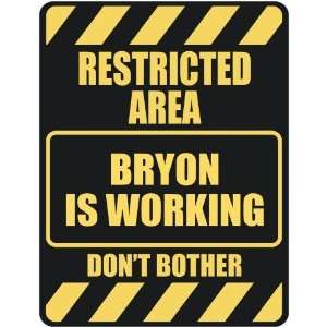   RESTRICTED AREA BRYON IS WORKING  PARKING SIGN