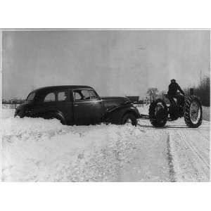   ,Maine,ME,auto being pulled out of snow bank,1947