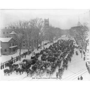   ,Main Street of town filled with sleighs,people,1907