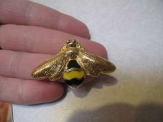 up for auction is a vintage goldtone sined monet bee