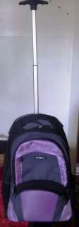 Samsonite luggage backpack with wheels black & purple  