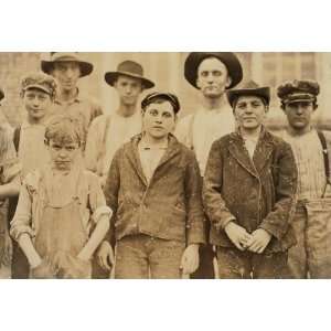   Cotton Mill, Macon, Ga. Boy with hands in pockets been in mill 1 year