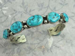 VINTAGE SOUTHWESTERN TRIBAL STERLING SILVER TURQUOISE ROW CUFF 
