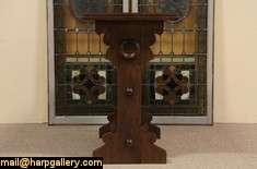  style, this Bible or book stand might be a reception desk as well