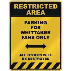 RESTRICTED AREA  PARKING FOR WHITTAKER FANS ONLY  PARKING SIGN NAME
