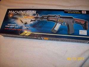 Toy plastic machine gun mz8655 flashing lights sound dagger tip NEW 