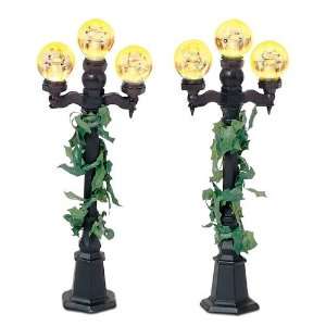    Dept. 56 Village accessory Holly covered Lampposts
