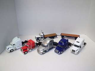 Pete 388 w/flat bed, 4 extra petes, & 2 volvo cabs  