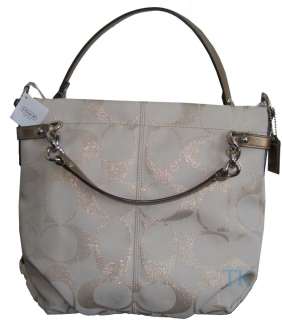   100 % authentic brand new coach handbag with top zipper closure coach