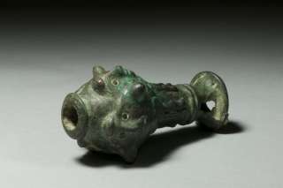 An extremely rare ancient Near Eastern figural bronze mace head 