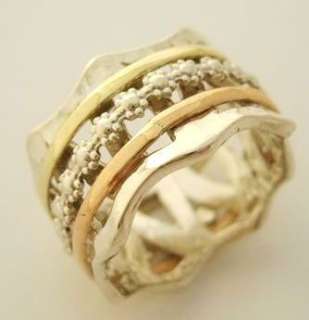 Silver and gold ring with 3 spinning bands 2 Golden spinning bands 