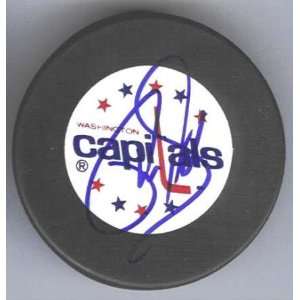  Phil Housley Autographed Hockey Puck
