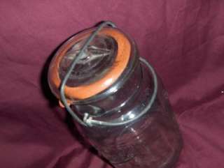 ANTIQUE BALL IDEAL JAR WITH WIRE BAIL AND LID  