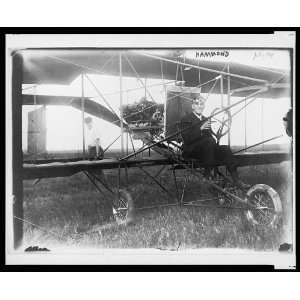  Glenn Hammond Curtiss,aviator,seated on airplane,1911 
