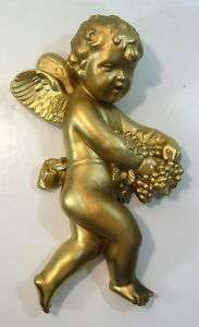   WINGED CHERUB HOLDING GRAPES WALL FIGURINE WITH ANTIQUE GOLD FINISH