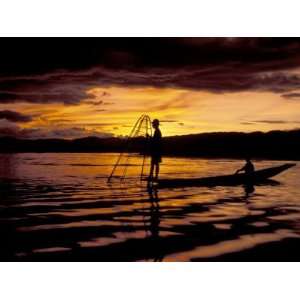  Intha Fisherman Rowing Boat With Legs at Sunset, Myanmar 