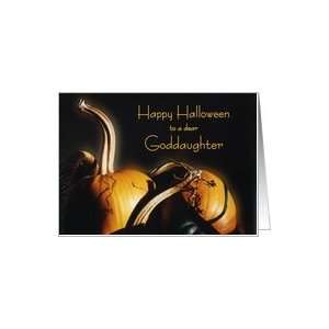 Happy Halloween goddaughter, Orange pumpkins in basket with shadows 